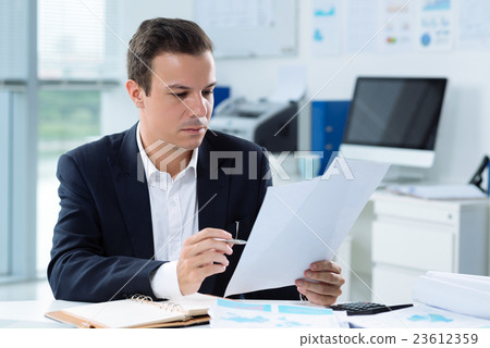 Reading a document Reading a document 23612359