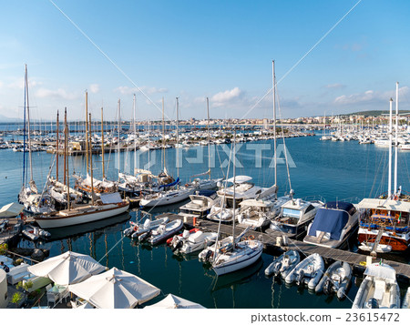 Classic white yachts anchored in the port  23615472