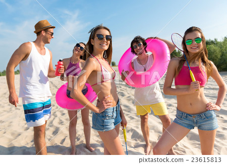Joyful friends having fun on the beach Joyful friends having fun on the beach 23615813