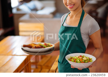 Serving food Serving food 23620459