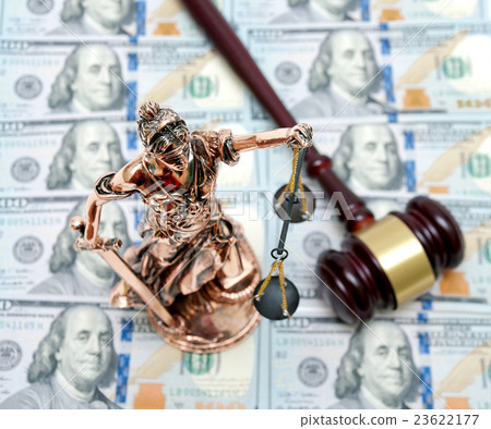 Statue of Justice on dollars background Statue of Justice on dollars background 23622177