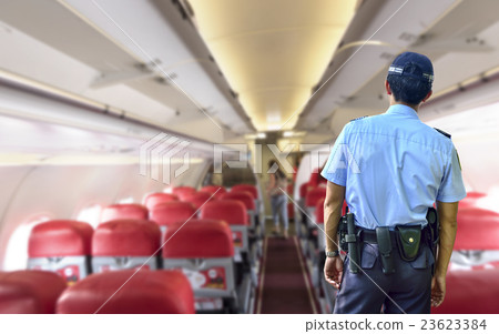 Security guard in inside airplane, airplane cabins 23623384