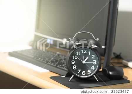 alarm clock and computer monitor background 23623457