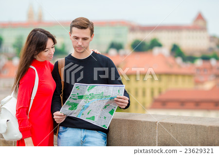 Romantic couple walking together in Europe. Happy Romantic couple walking together in Europe. Happy 23629321