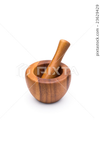 wooden mortar on a white background wooden mortar on a white background 23629429