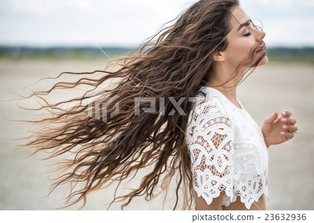 Portrait of a beautiful brunette 23632936