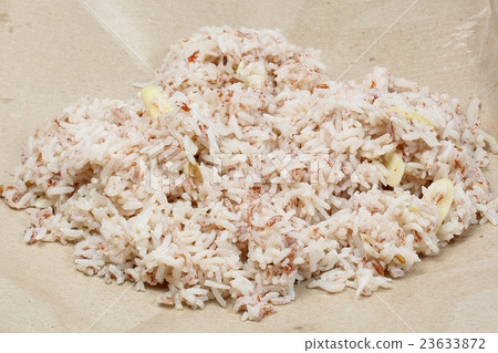 Nasi Dagang Red Rice cooked with coconut milk Nasi Dagang Red Rice cooked with coconut milk 23633872