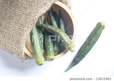 Healthy okra chips on clean background Healthy okra chips on clean background 23633965