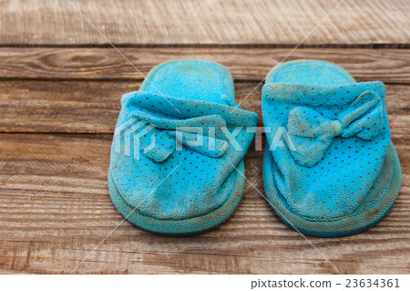 Old dirty homemade slippers 23634361
