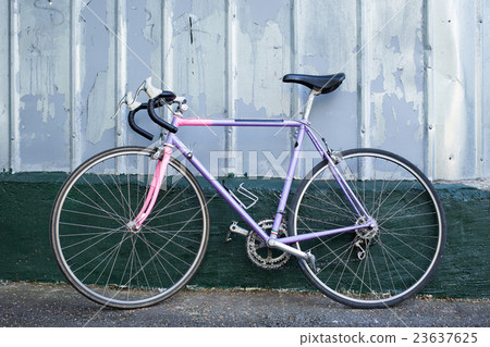 sports bike standing near wall 23637625