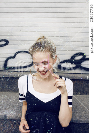 young pretty party girl smiling covered with young pretty party girl smiling covered with 23637756