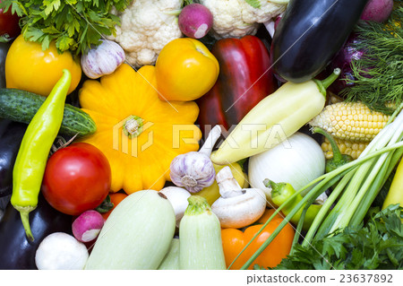 Background of fresh vegetables and greens closeup Background of fresh vegetables and greens closeup 23637892