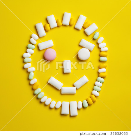 Funny smily face made of chewing gums 23638063