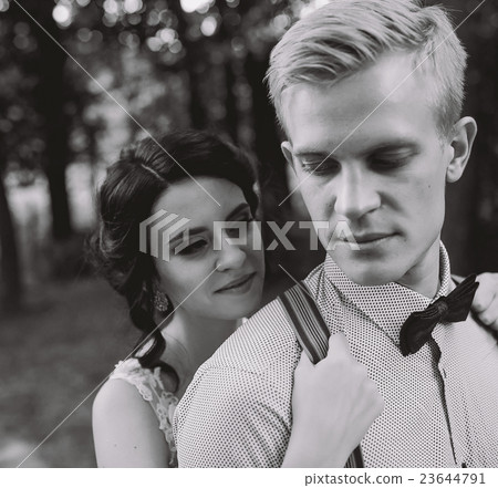 Beautiful wedding couple posing 23644791