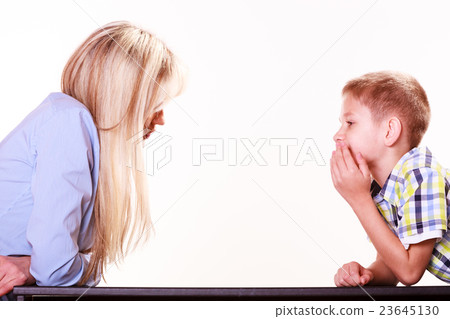 Mother and son talk and argue sit at table. Mother and son talk and argue sit at table. 23645130