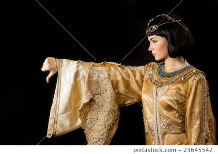 Serious Egyptian woman like Cleopatra with thumbs 23645542