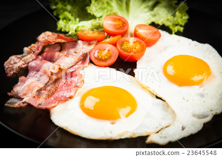 Traditional breakfast on a plate 23645548