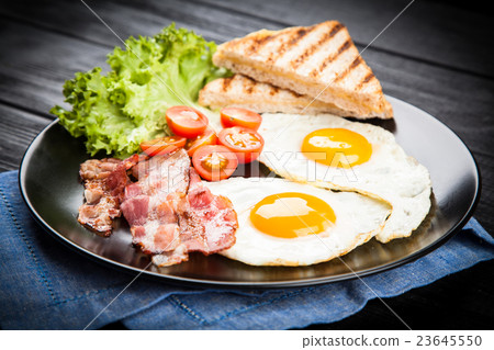 Traditional breakfast on a plate 23645550