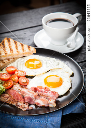 Traditional breakfast on a plate 23645555