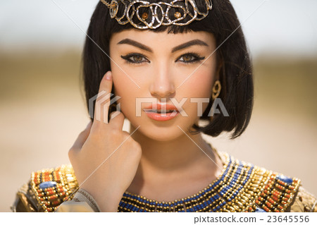 Beautiful woman with fashion make-up and hairstyle 23645556