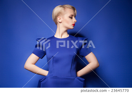 Elegant fashion model with short blonde hair Elegant fashion model with short blonde hair 23645770