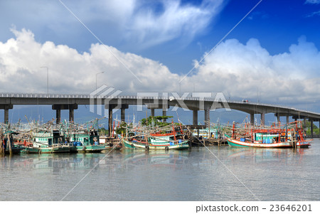 Fishery boats're mooring at the harbour Fishery boats're mooring at the harbour 23646201