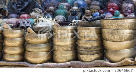 singing bowls displayed at a market in Kathmandu 23646667