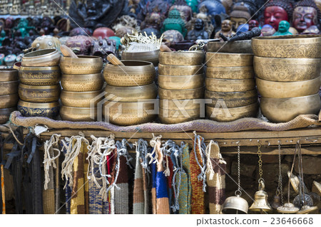 singing bowls displayed at a market in Kathmandu singing bowls displayed at a market in Kathmandu 23646668