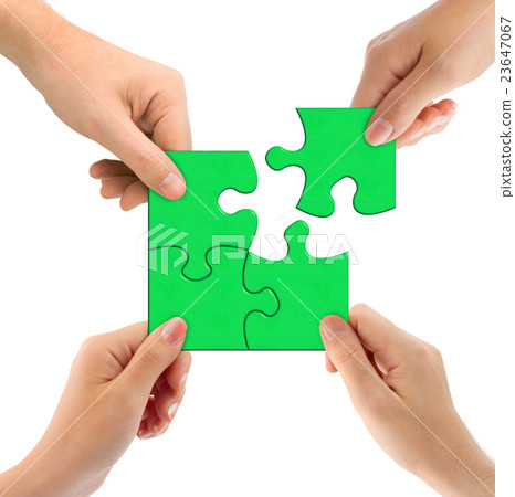 Hands and puzzle 23647067