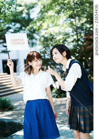 Girls high school student who came to the school and female students who guide 23654436
