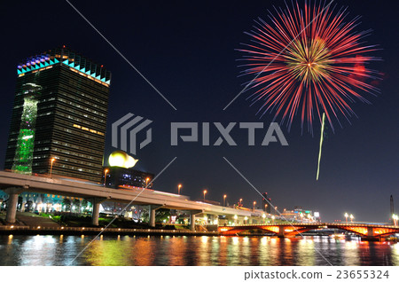 Fireworks and the sky tree reflected in the building 23655324