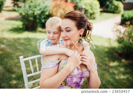 happy family together in picnic, colorful outdoors happy family together in picnic, colorful outdoors 23658457