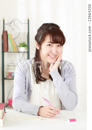 A girl studying the examination exam 23664208