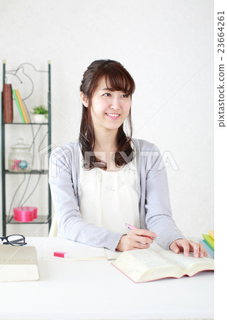 A girl studying the examination exam 23664261