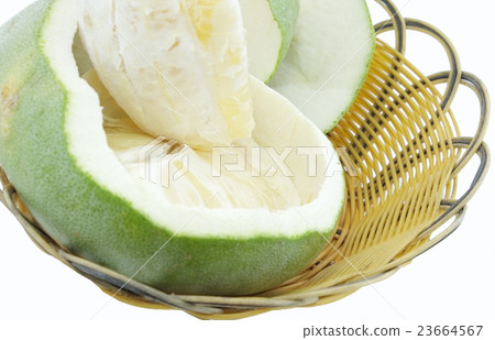 Green pomelo citrus fruit on wood Basket 23664567