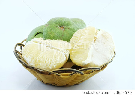 Green pomelo citrus fruit on wood Basket 23664570