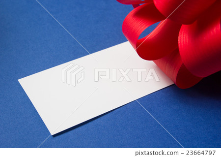 Hand holding white business card on background Hand holding white business card on background 23664797