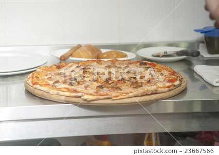 Traditional way baked Italian pizza Traditional way baked Italian pizza 23667566