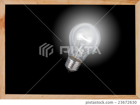 bulb light on blackboard bulb light on blackboard 23672630
