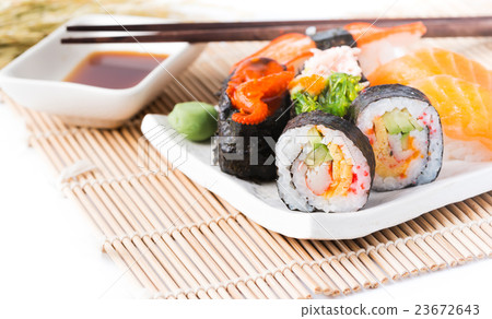 sushi on white dish isolated 23672643