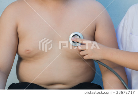Obese asian boy check heart by stethoscope 23672717