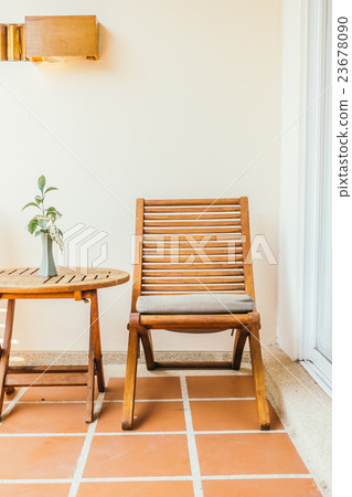 Empty chair and table Empty chair and table 23678090