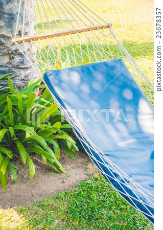 Empty hammock in the garden 23678357