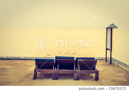 Empty chair on the beach 23678373