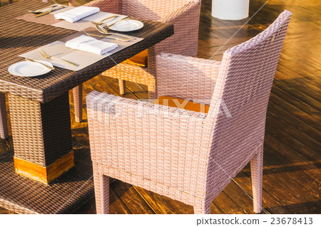 Empty table and chair 23678413