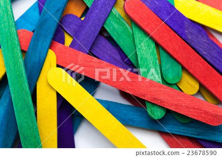 Colorful popsicle sticks over white background Colorful popsicle sticks over white background 23678590