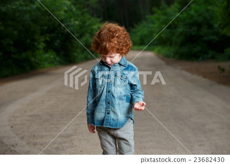 cute little emotional boy outdoors 23682430