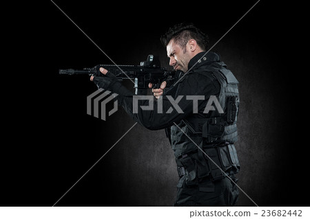 Three soldiers in full uniform with guns is going Three soldiers in full uniform with guns is going 23682442