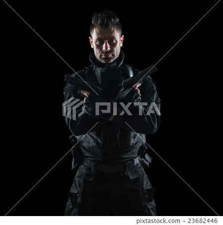 Three soldiers in full uniform with guns is going Three soldiers in full uniform with guns is going 23682446