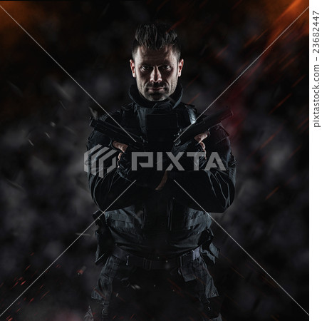 Three soldiers in full uniform with guns is going Three soldiers in full uniform with guns is going 23682447
